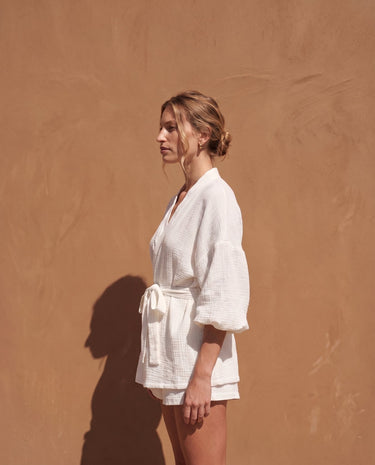 White Seaside Amalfi Set in white — side view on model showing the blouson sleeve and shorts