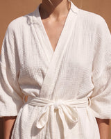 White Seaside Amalfi Set in white — close-up of the wrap front, V neckline and self-tie belt