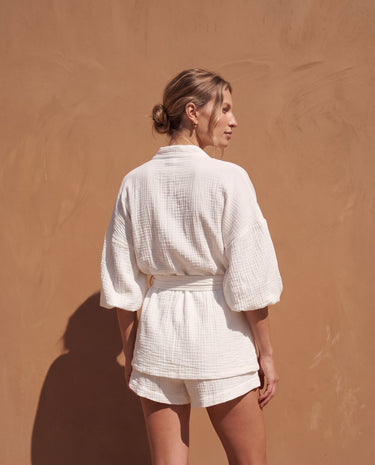 White Seaside Amalfi Set in white — back view on model showing the shorts and relaxed fit