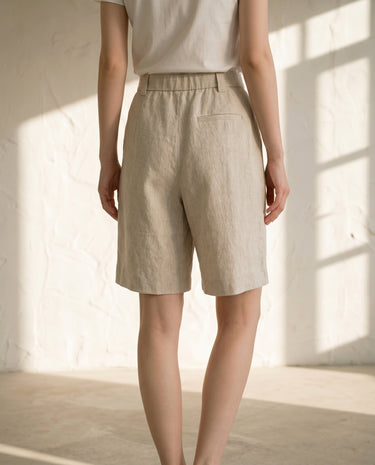 Linen-colour tailored shorts on model, back view – Moriel Heritage
