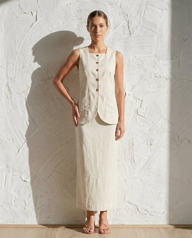 Cream buttoned vest and maxi skirt set on model, front view – Moriel Heritage
