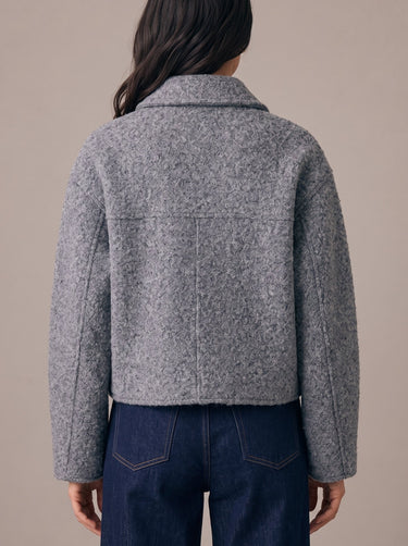 Zoe Coat in gray — back view on model showing the polo collar and boxy cut